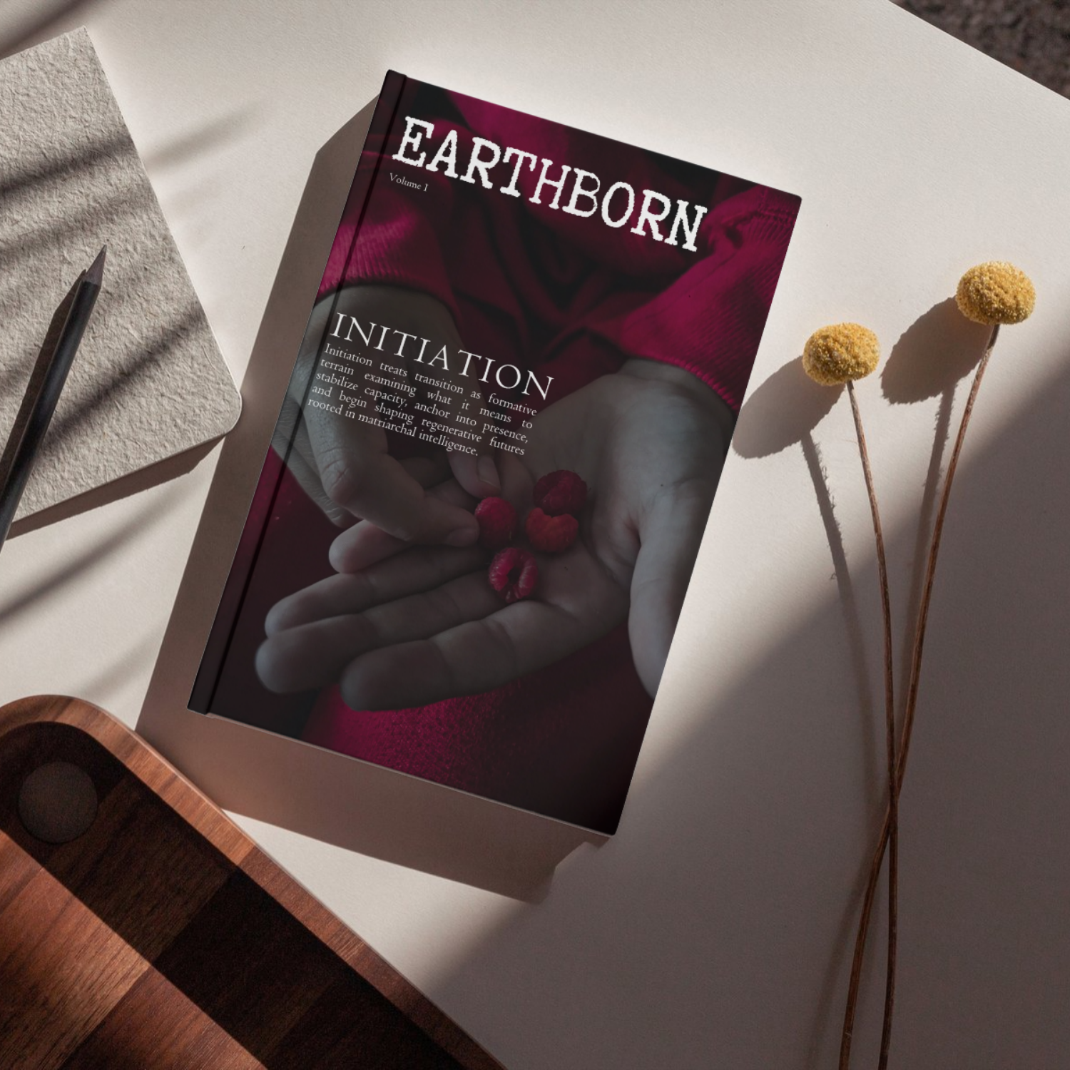 An issue of Earthborn Magazine lying flat on a coffee table.